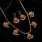 Jewelry set with necklace and earrings on a black background